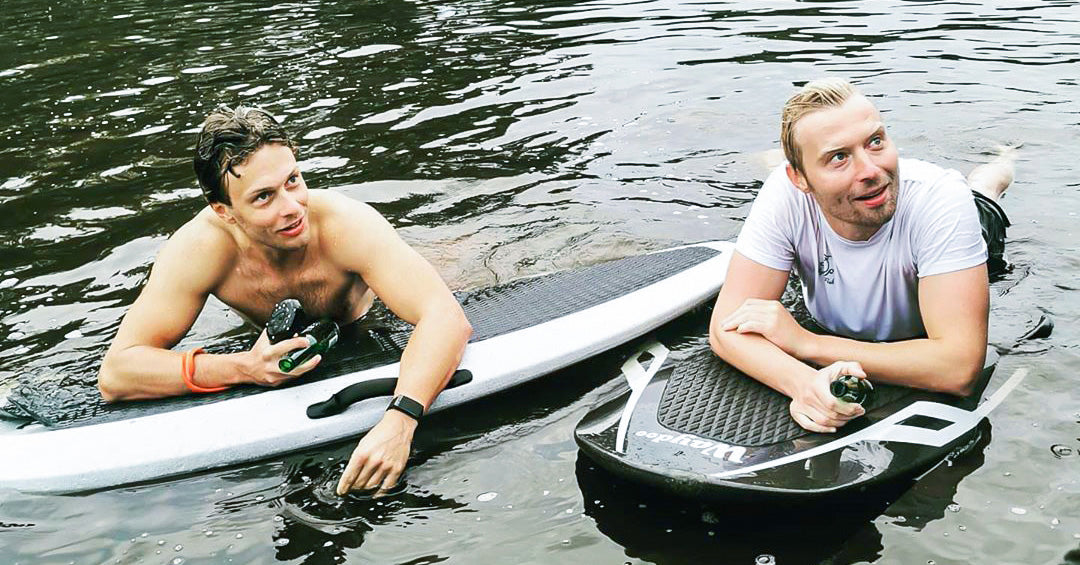 two men on the eletric hydrofoil boards